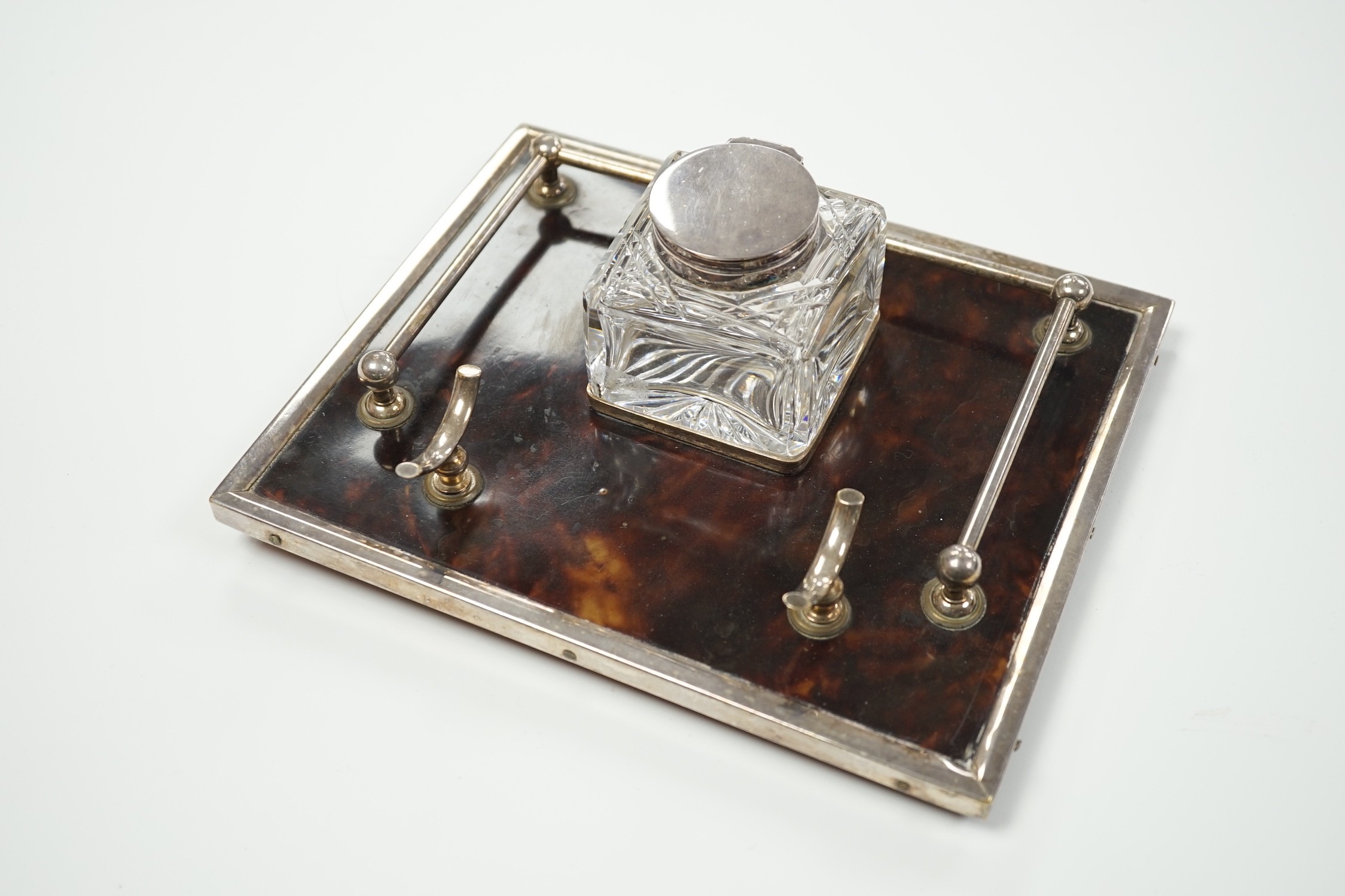 A silver plate mounted tortoiseshell inkstand, 21.5cm wide